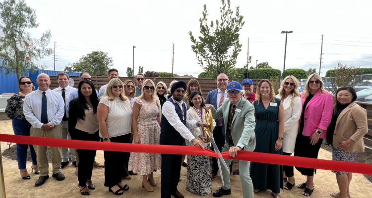 Los Alamitos Unified School District board trustees, administrators and community members "cut the ribbon" to open its new WellSpace garden on Sept. 6. (Courtesy of Los Alamitos Unified)