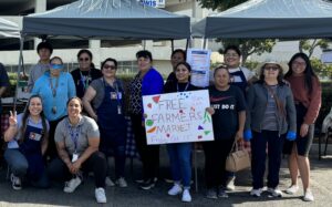 Argosy farmers market volunteers