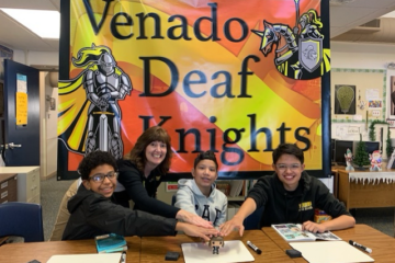 Students from OCDE's Hard of Hearing Program at Venado Middle School gather with teacher Janet Dicker before competing against students from the Iowa School for the Deaf in the national Battle of the Books competition.