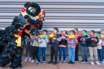 Roosevelt Elementary School students watched lion dances during a Lunar New Year celebration on Feb. 9. (Courtesy of Anaheim Elementary School District)