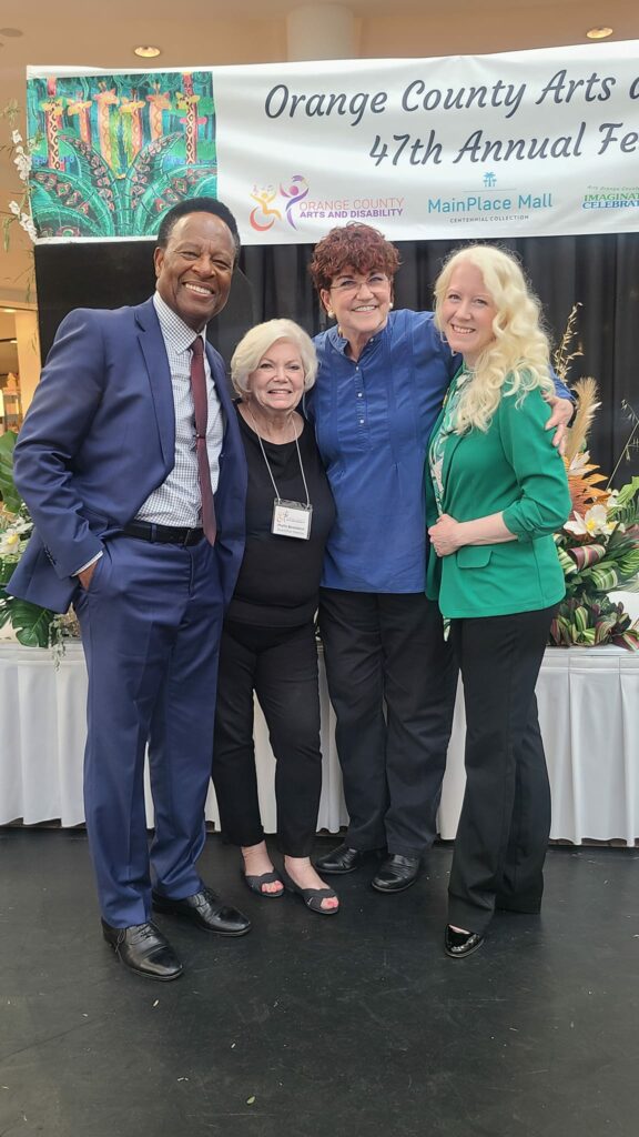 William Allen Young, Phyllis Berenbein, Paula Dunn and Marleena Barber posed for a photo before the 2023 Orange County Arts and Disability Festival began.