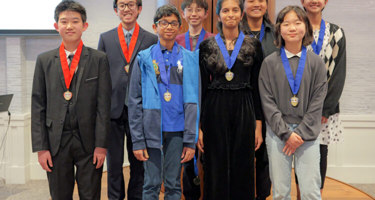 Orange County students receive medals for their projects at the National History Day - Orange County awards ceremony on March 13.