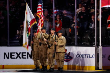 Sunburst Youth Academy cadets proudly present the colors at the Anaheim Ducks' game against the Seattle Kraken on Friday, April 5.