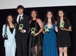 Los Alamitos High School students Emily Fitzgerald, Jessica Bae, Ella Shapiro and Kyan Whiten win first place in the mental health category at the 2024 Directing Change Film Program and Contest awards on May 21. (Courtesy of the Directing Change Program & Film Contest)