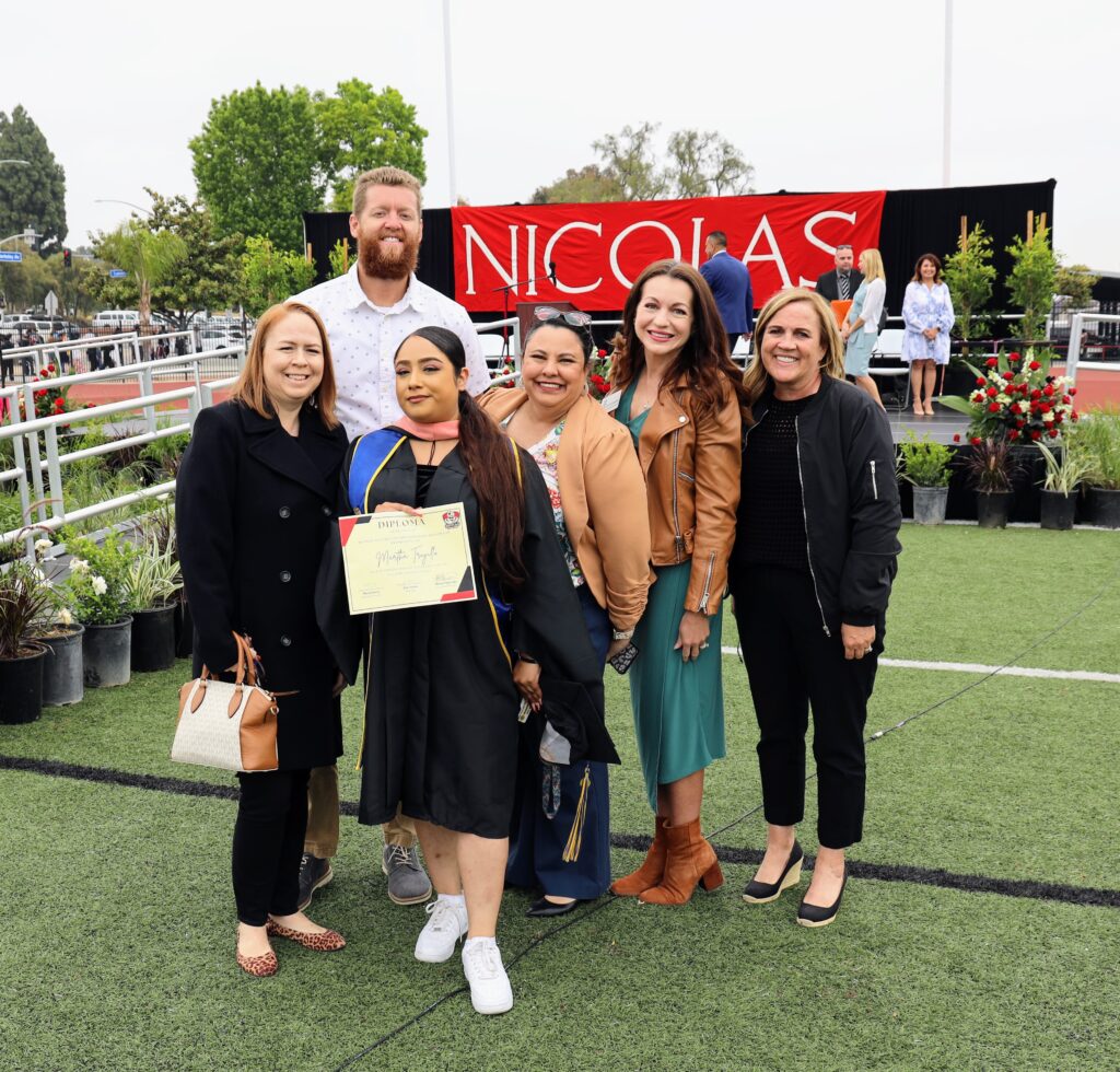 Former Fullerton School District student Martha Trujillo celebrates receiving her honorary certificate of promotion alongside Fullerton School District director Rossana Fonseca and administrator Dr. Helene Morris, on May 31. (Fullerton School District) 