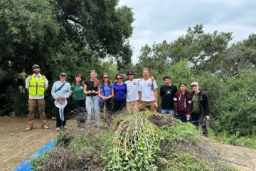 Teacher Danica Perez (far right) and her students, accompanied by local biologists, lead a successful cleanup effort at Coyote Hills Tree Park in May, focusing on removing invasive plants to restore the park's natural ecosystem.