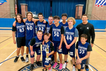The eighth-grade boys basketball team at Spring View Middle School wins the districtwide championship in February. (Courtesy of Ocean View School District)