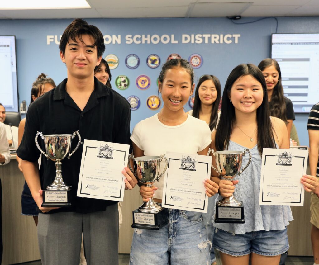 Fullerton School District students Natalie Hong, Annette Lee and Apollo Meneses are honored for their individual awards on Aug. 20. (Courtesy of Fullerton School District)