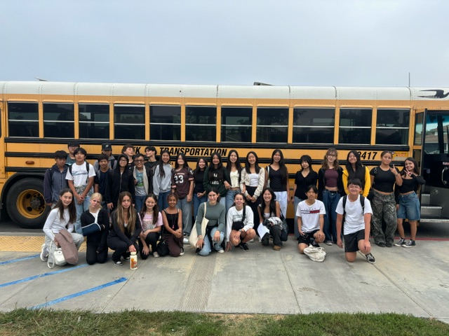 Eighth-grade students from Fulton Middle School pose in front of the bus that brought them to Hyundai’s headquarters for a day of learning and hands-on activities.