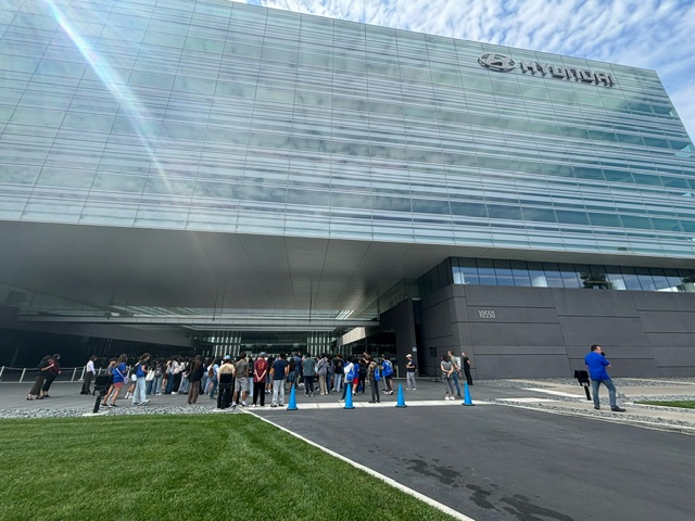 Fulton Middle School students stand outside Hyundai’s North American headquarters in Fountain Valley during a field trip to explore careers in the automotive industry.