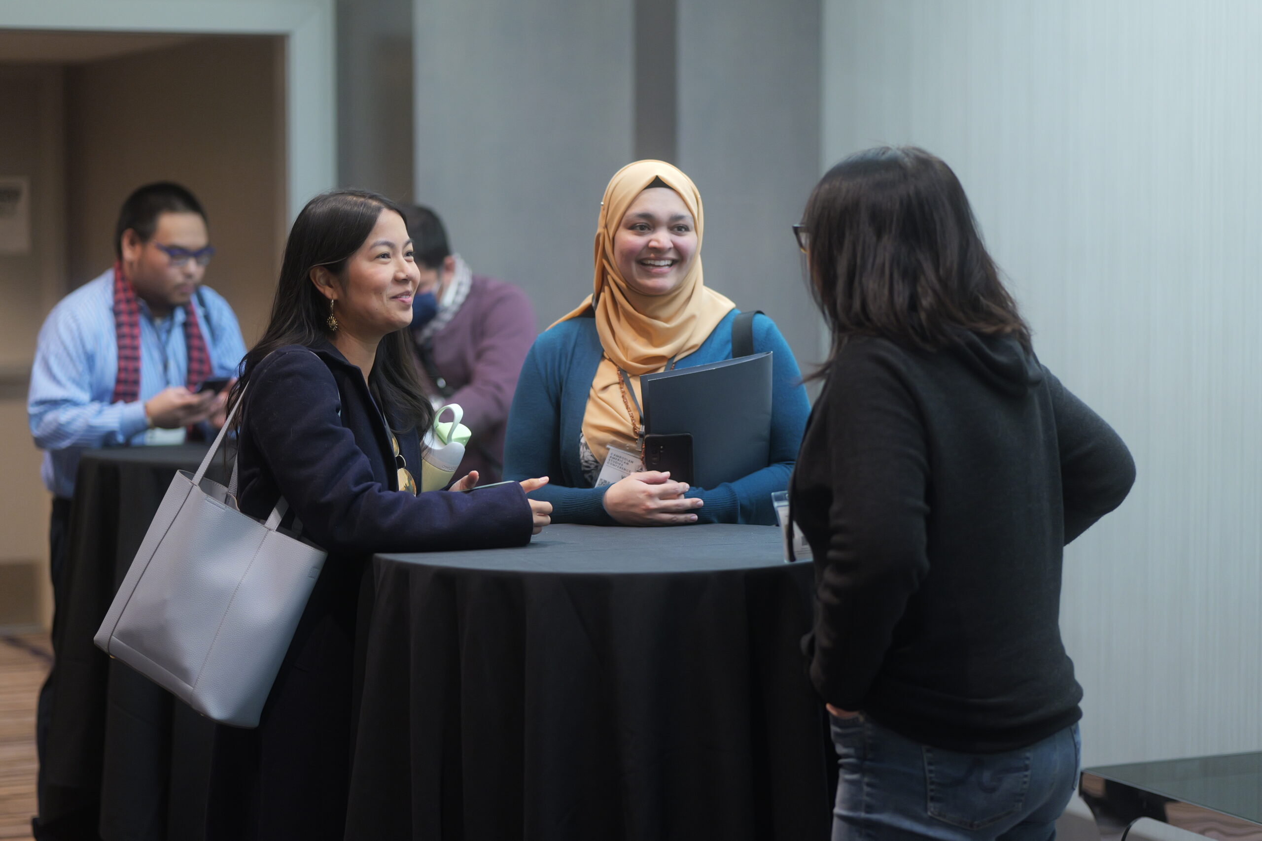 Educators and community members collaborate during a breakout session, exploring ways to implement the Cambodian American Studies Model Curriculum in their schools.