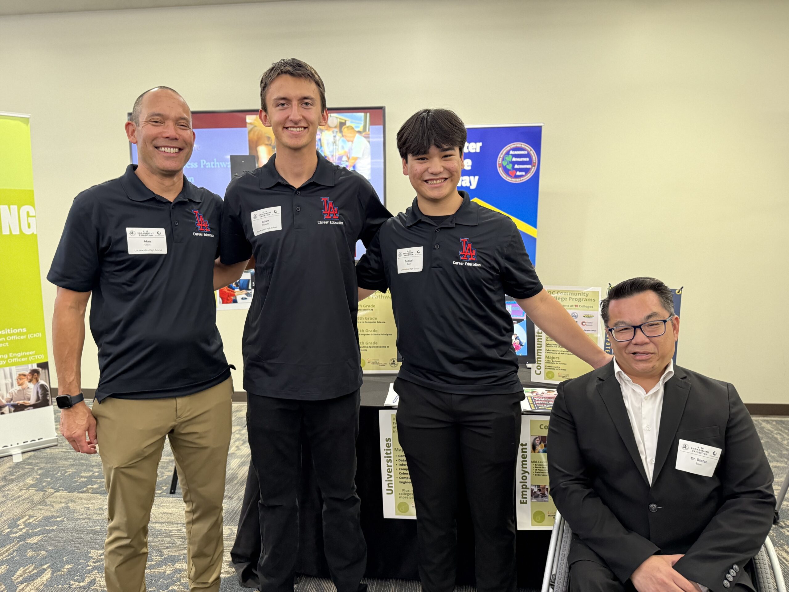 Orange County Superintendent of Schools Dr. Stefan Bean meets with  students and staff from Los Alamitos Unified School District at the OC Pathways K-16 Collaborative Engagement Exhibition on Dec. 2. 