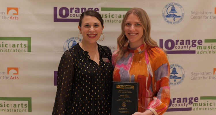 Alicia Parker, the 2024 OCMAA Award recipient for Elementary Visual Art from the Irvine Unified School District, is pictured with award presenter Victoria Gerard, deputy director of the Laguna Art Museum, during last year’s Orange County Music and Arts Administrators Awards Ceremony.