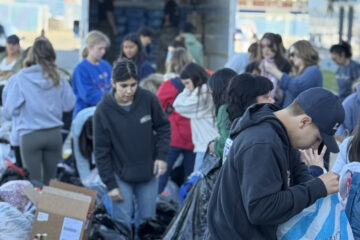 Los Alamitos High School students and staff organize donations for fire victims on Sunday, Jan. 12.