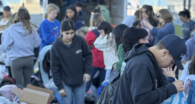 Los Alamitos High School students and staff organize donations for fire victims on Sunday, Jan. 12.