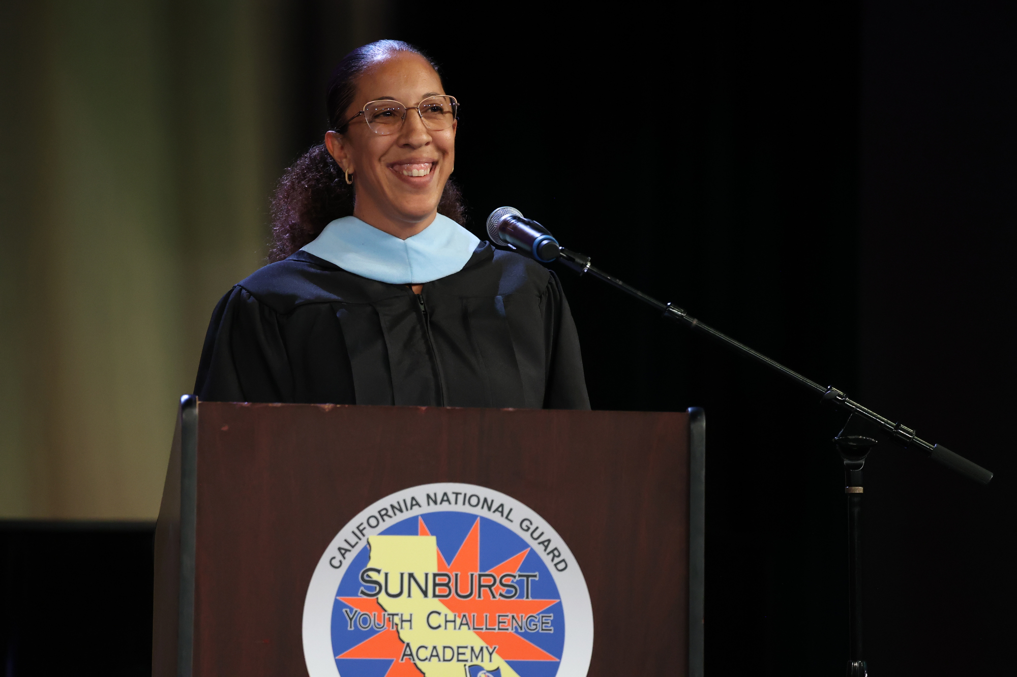 Sunburst Principal Dinah Ismail speaks at the graduation ceremony