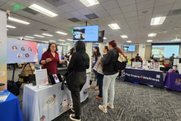 Participants visit vendor tables during the inaugural Thrive Resource Fair in 2024, hosted by the Orange County Department of Education.