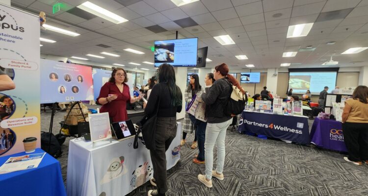 Participants visit vendor tables during the inaugural Thrive Resource Fair in 2024, hosted by the Orange County Department of Education.