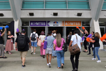 Attendees enter the arena at the Anaheim Convention Center for the 2025 CA MTSS Professional Learning Institute.