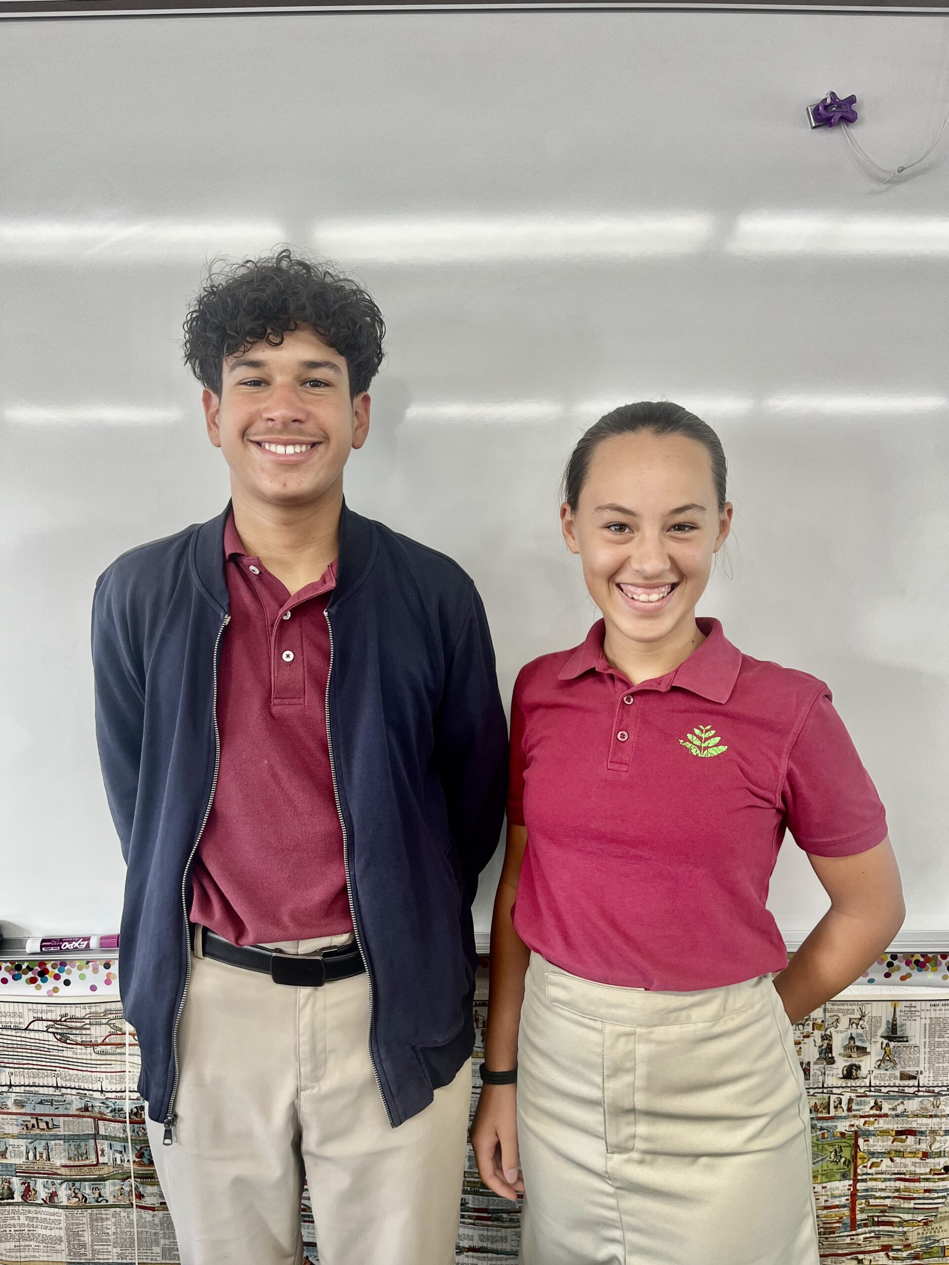 Acaciawood Preparatory Academy students Lucas Menendez, left, and Poiema Bernier at school. The pair earned the $2,000 Outstanding Middle School Project Award in the 2025 Discovery Award competition.