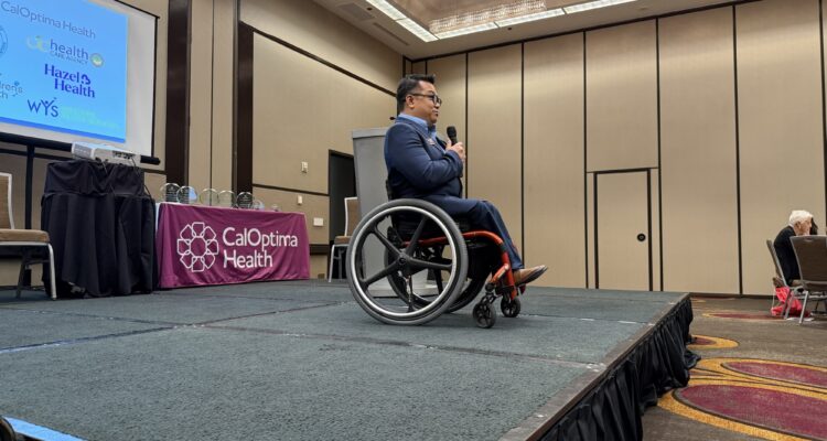 Dr. Stefan Bean speaks on stage at the SBHIP Partners Appreciation Luncheon