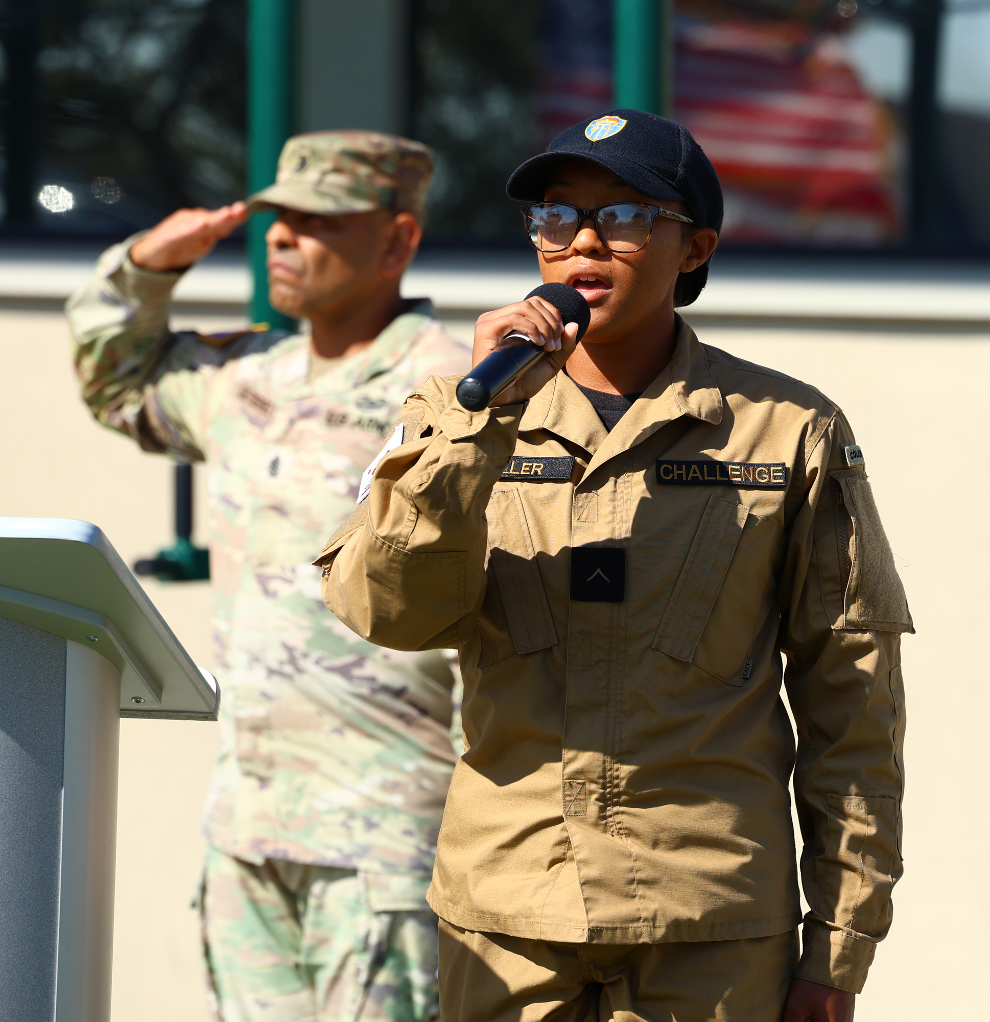 Sunburst Youth Academy cadet Miller sings the national anthem during a ceremony at Joint Forces Training Base in Los Alamitos, where the academy was recognized as one of 12 campuses to receive OCDE’s inaugural School Impact Award.