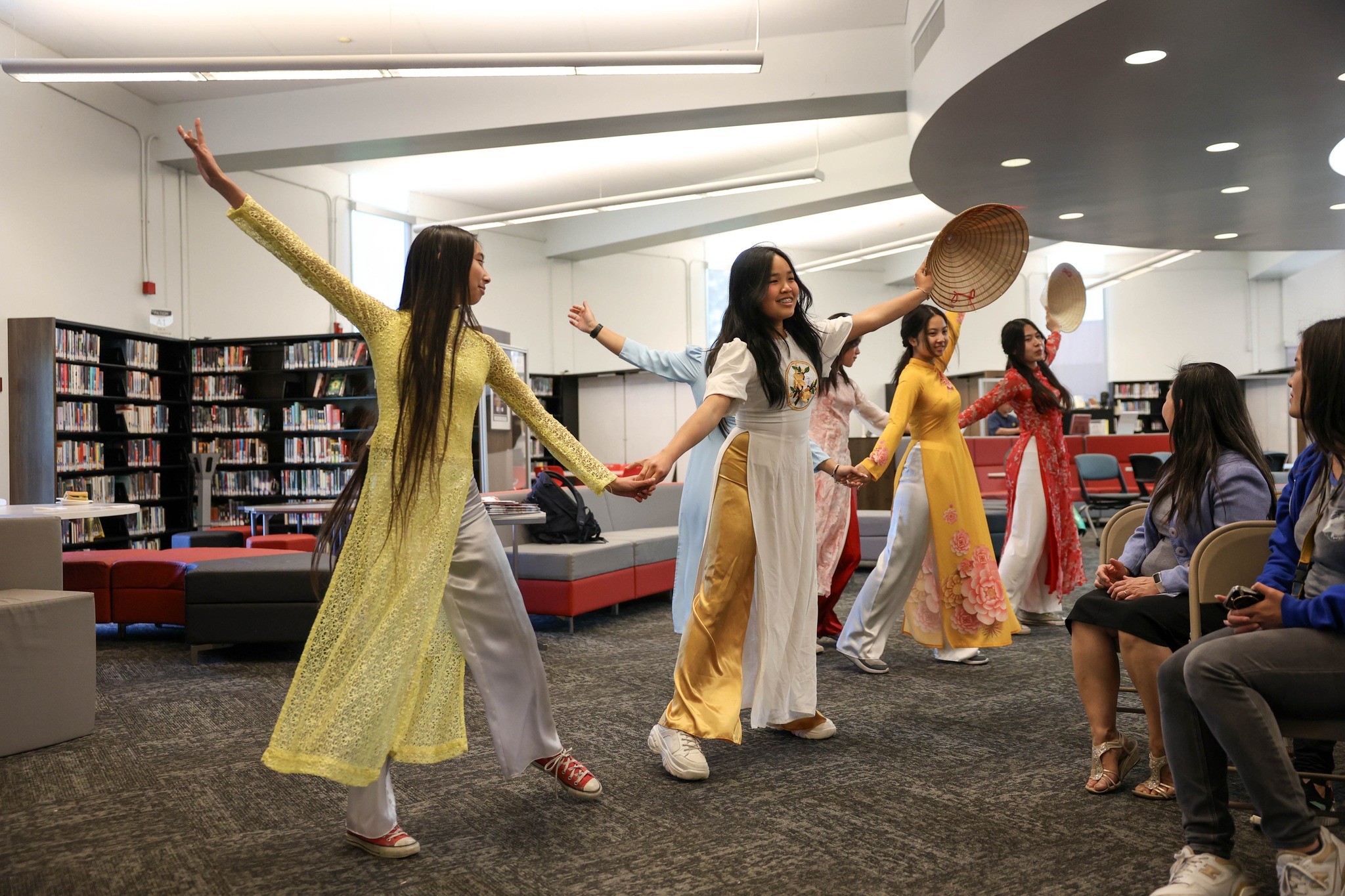 Westminster High School students performed a traditional Vietnamese dance in áo dài attire during the March 20, 2024, celebration of the Vietnamese Dual Language Immersion program pathway.