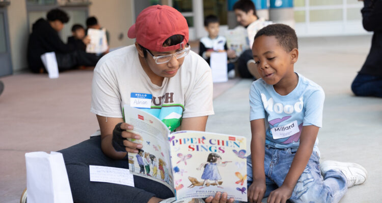 Eighth-grade students from Valadez Middle School Academy read "Piper Chen Sings" with first graders from Melrose and Rio Vista elementary schools during the 15th annual Read for the Record event on Oct. 26, 2024. The celebration, part of a worldwide literacy campaign, promotes the importance of early reading and language development.
