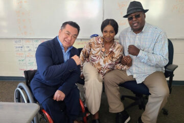 Orange County Superintendent Dr. Stefan Bean meets former heavyweight boxing champion James "Buster" Douglas and his wife, Bertha Douglas, during their visit to OCDE's Otto Fischer School.