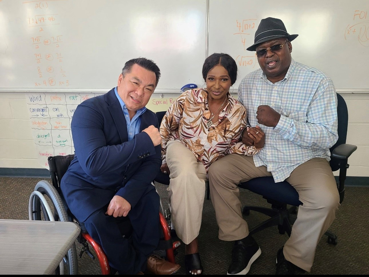 Orange County Superintendent Dr. Stefan Bean meets former heavyweight boxing champion James "Buster" Douglas and his wife, Bertha Douglas, during their visit to OCDE's Otto Fischer School.