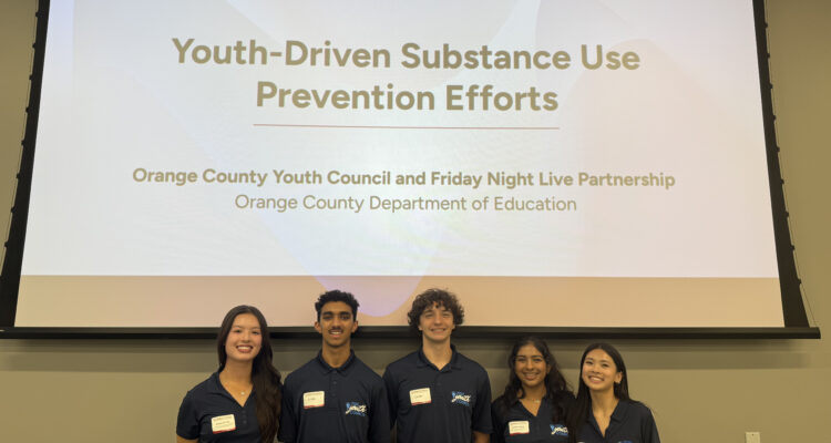 Five student leaders from the Orange County Youth Council pose for a photo at the Red Ribbon in Action event, held Oct. 29 at the OCDE Conference Center.