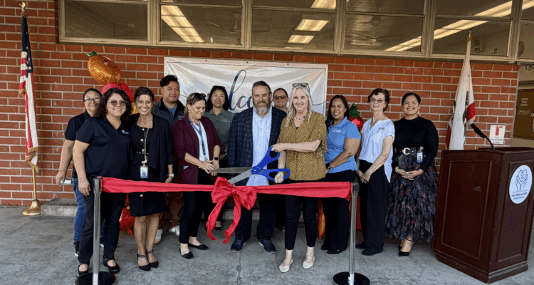 Westminster School District officials including Superintendent Dr. Gunn Marie Hansen and Johnson Middle School Principal Daniel Owens cut the ribbon on the opening of the Helping Hands Food Pantry. (Courtesy of Westminster School District)