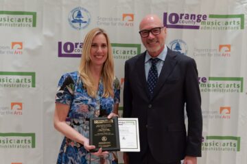 Gigi Manning, 2025 OCMAA Award recipient for secondary media arts, stands with award sponsor and presenter Steven Brittan, president and CEO of the Laguna College of Art + Design.