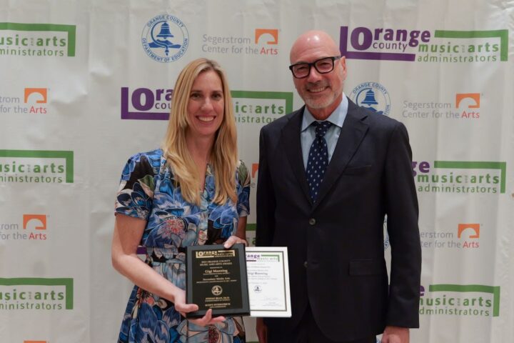 Gigi Manning, 2025 OCMAA Award recipient for secondary media arts, stands with award sponsor and presenter Steven Brittan, president and CEO of the Laguna College of Art + Design.