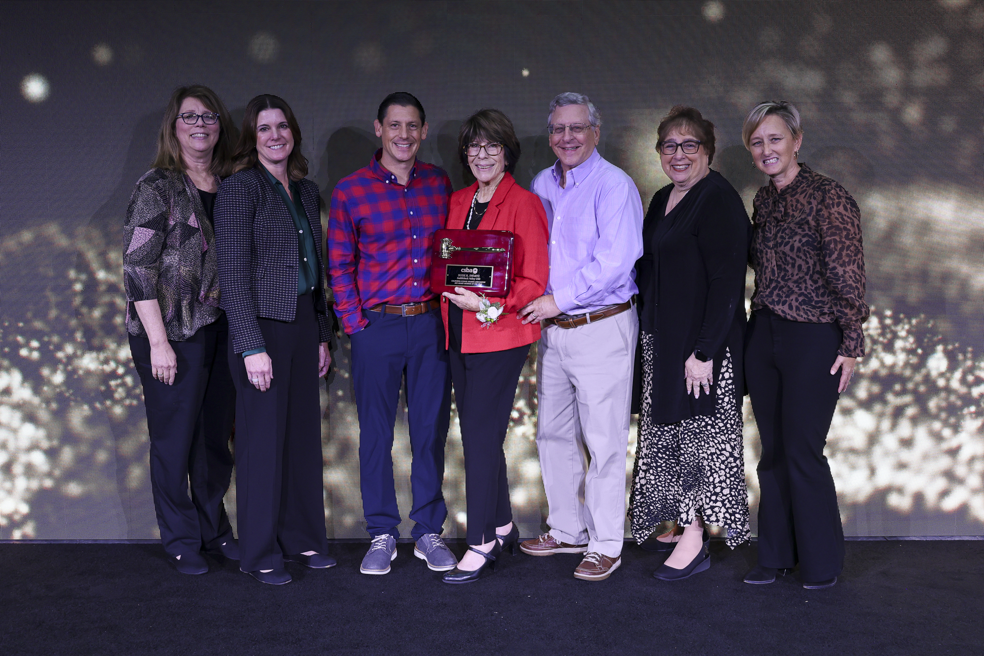 Suzie R. Swartz is joined by family members and district representatives after being honored as the California School Boards Association’s 2025 Board Member of the Year