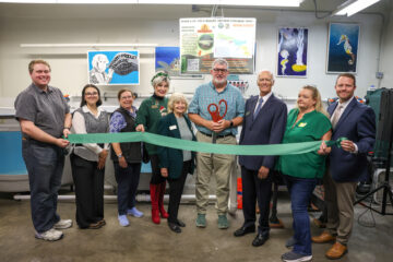 Huntington Beach Union High School District educators, administrators and board trustees celebrate the start of a new partnership between Edison High School and the California Department of Fish and Wildlife. (Huntington Beach Union High School District)