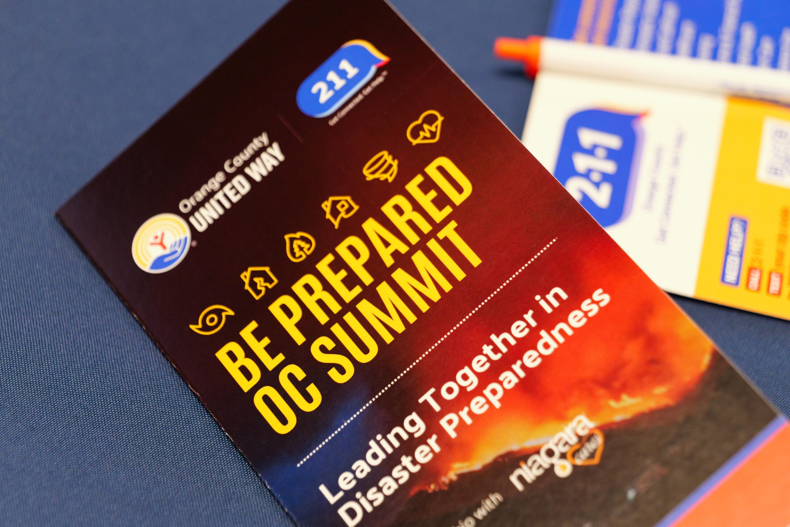 Printed program for the Be Prepared OC Summit: Leading Together in Disaster Preparedness, hosted by Orange County United Way and 211 Orange County.