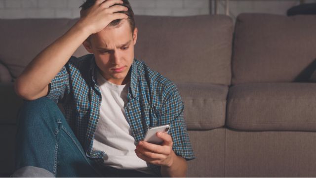 Boy looking at phone