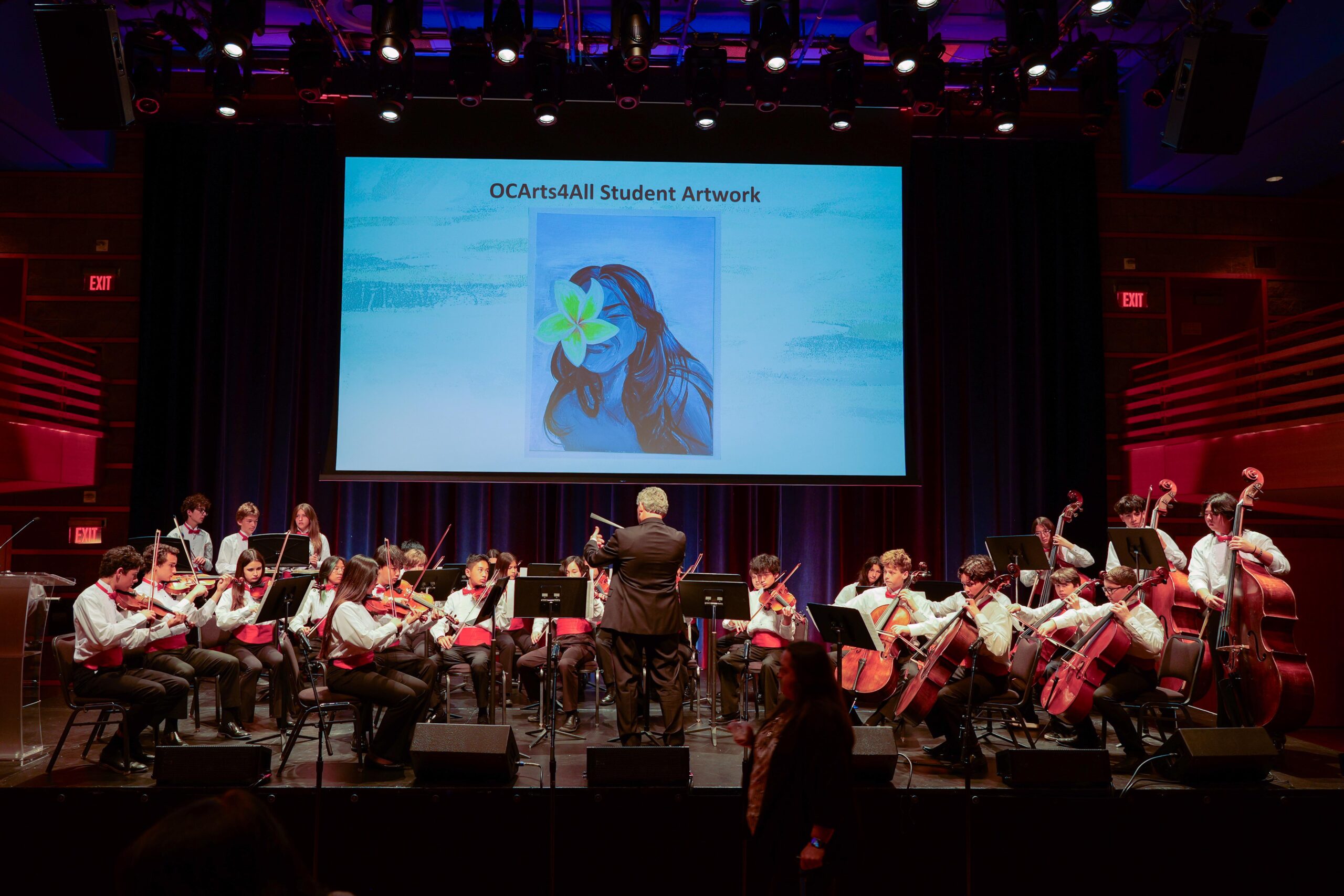 Dan Robbins, 2025 OCMAA Award recipient for secondary instrumental music from Saddleback Valley Unified School District, directs the La Paz Intermediate School string orchestra during a performance of “Spirit of ’76” at the 2026 OCMAA Awards.