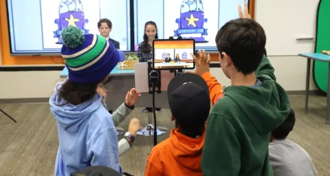 SeaCliff Elementary School students plan, produce and film their segments for the Sea Star News broadcast. (Don Leach / Daily Pilot Staff Photographer)