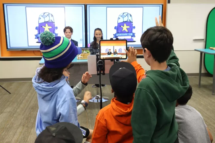 SeaCliff Elementary School students plan, produce and film their segments for the Sea Star News broadcast. (Don Leach / Daily Pilot Staff Photographer)