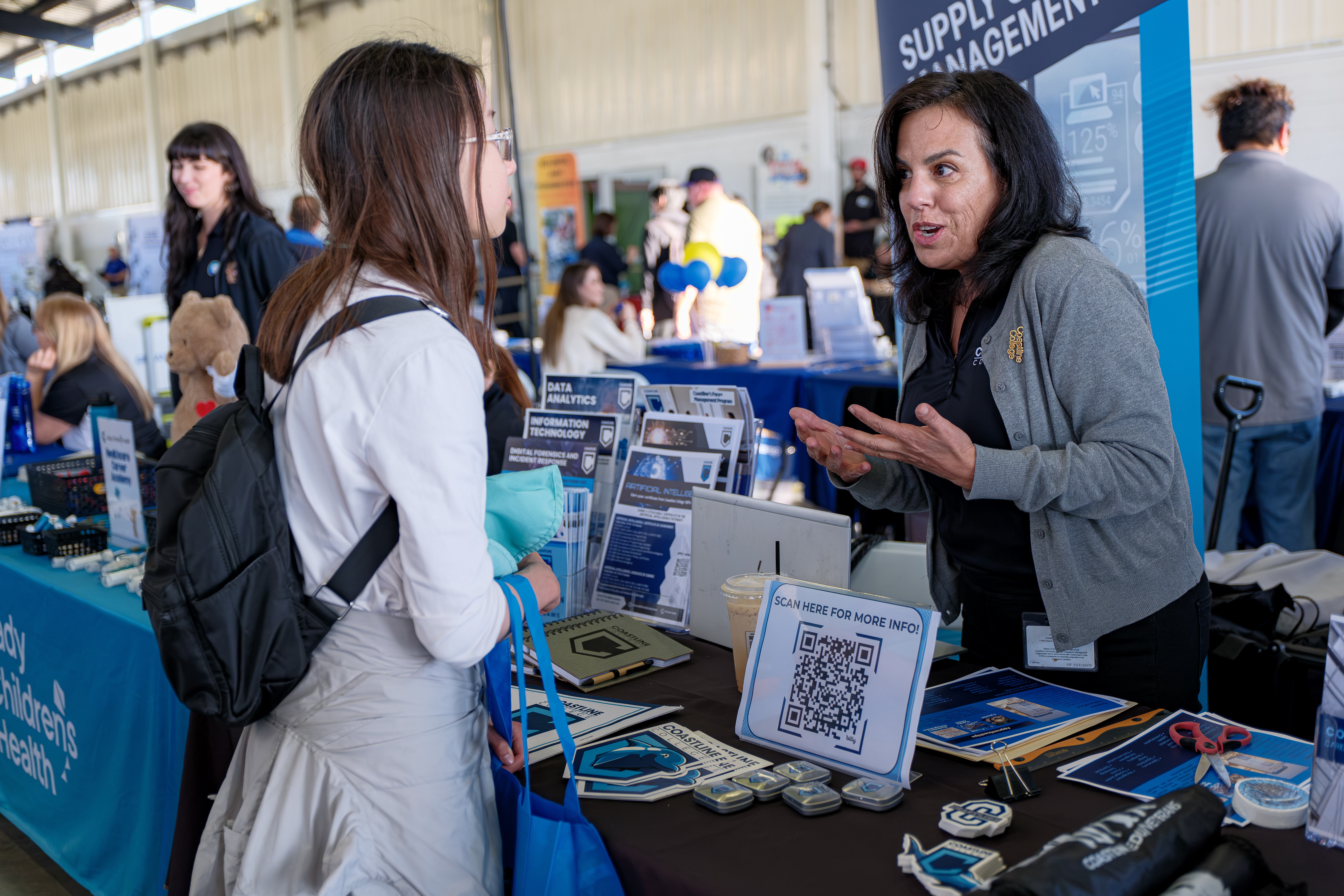 A representative from Coastline College shares information on CTE opportunities at the OC Pathways Showcase.