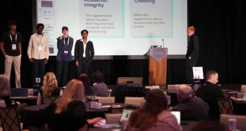 Students give a presentation on the ethics of AI at last year's Student and Community Voice AI Summit.