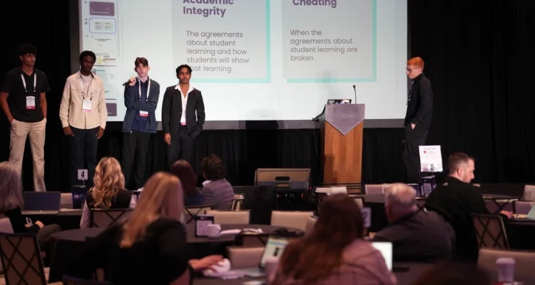Students give a presentation on the ethics of AI at last year's Student and Community Voice AI Summit.