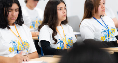 A student listens during a session at the AVID 9th Grade Leadership Conference at Pomona College.