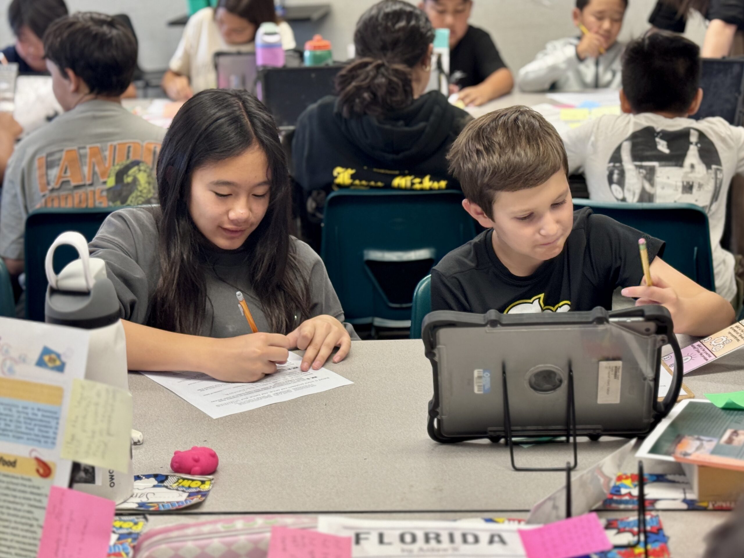 Students at Beechwood School in the Fullerton Unified School District work together on a homework assignment.