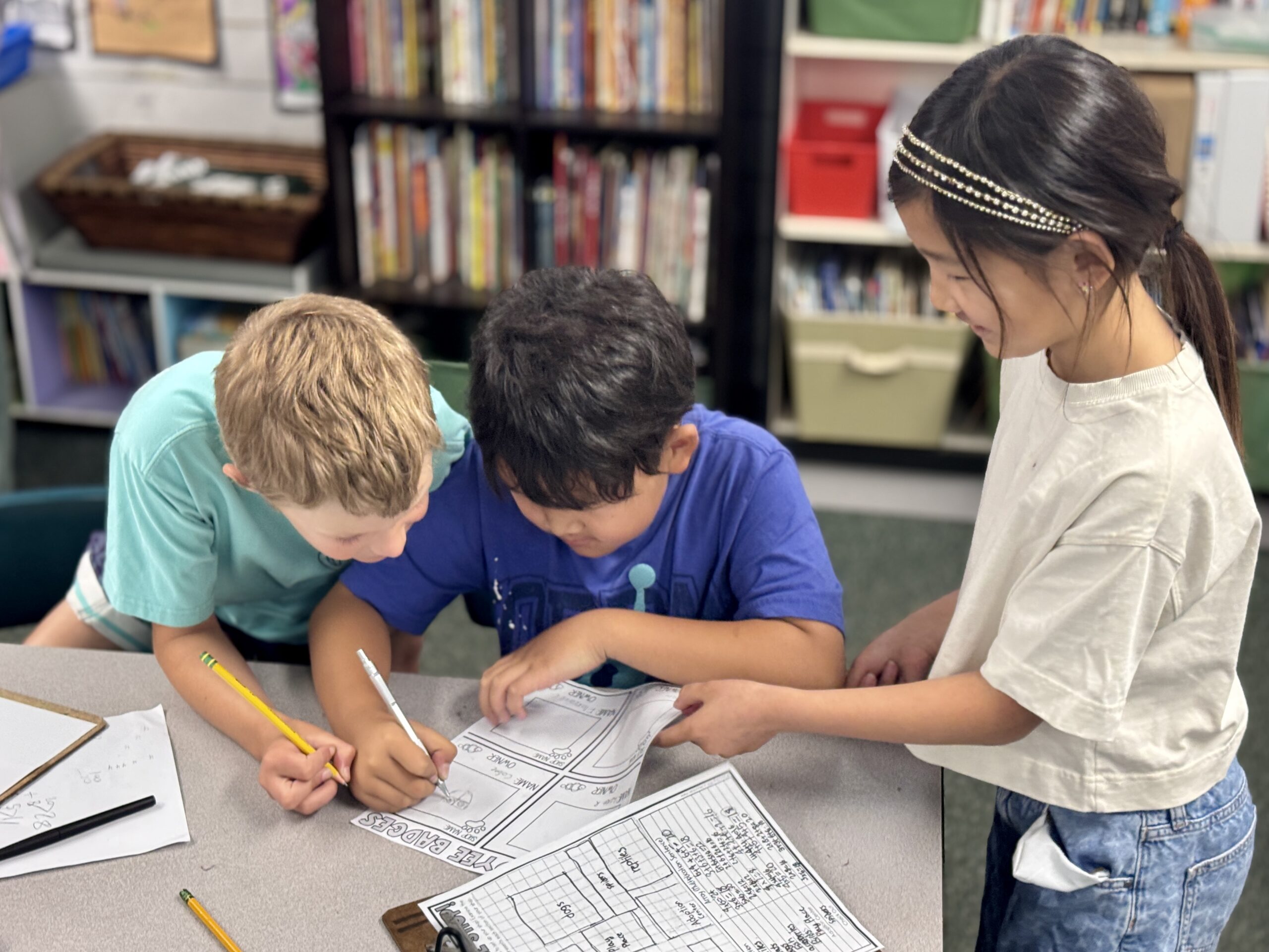 Students at Beechwood School in the Fullerton Unified School District work together on a homework assignment.