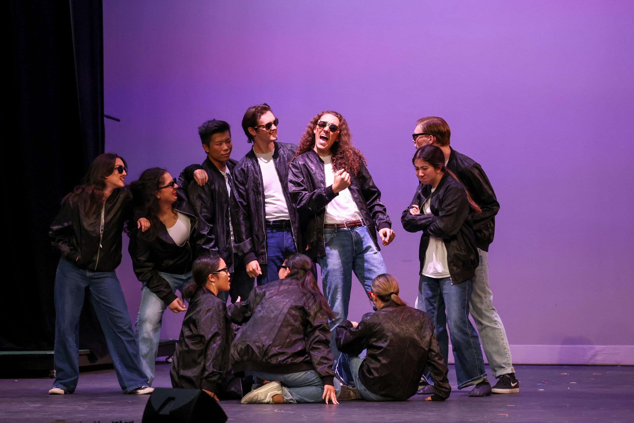 Students perform a musical number representing an early decade of the Huntington Beach Union High School District auditorium during a 100th anniversary celebration April 20.