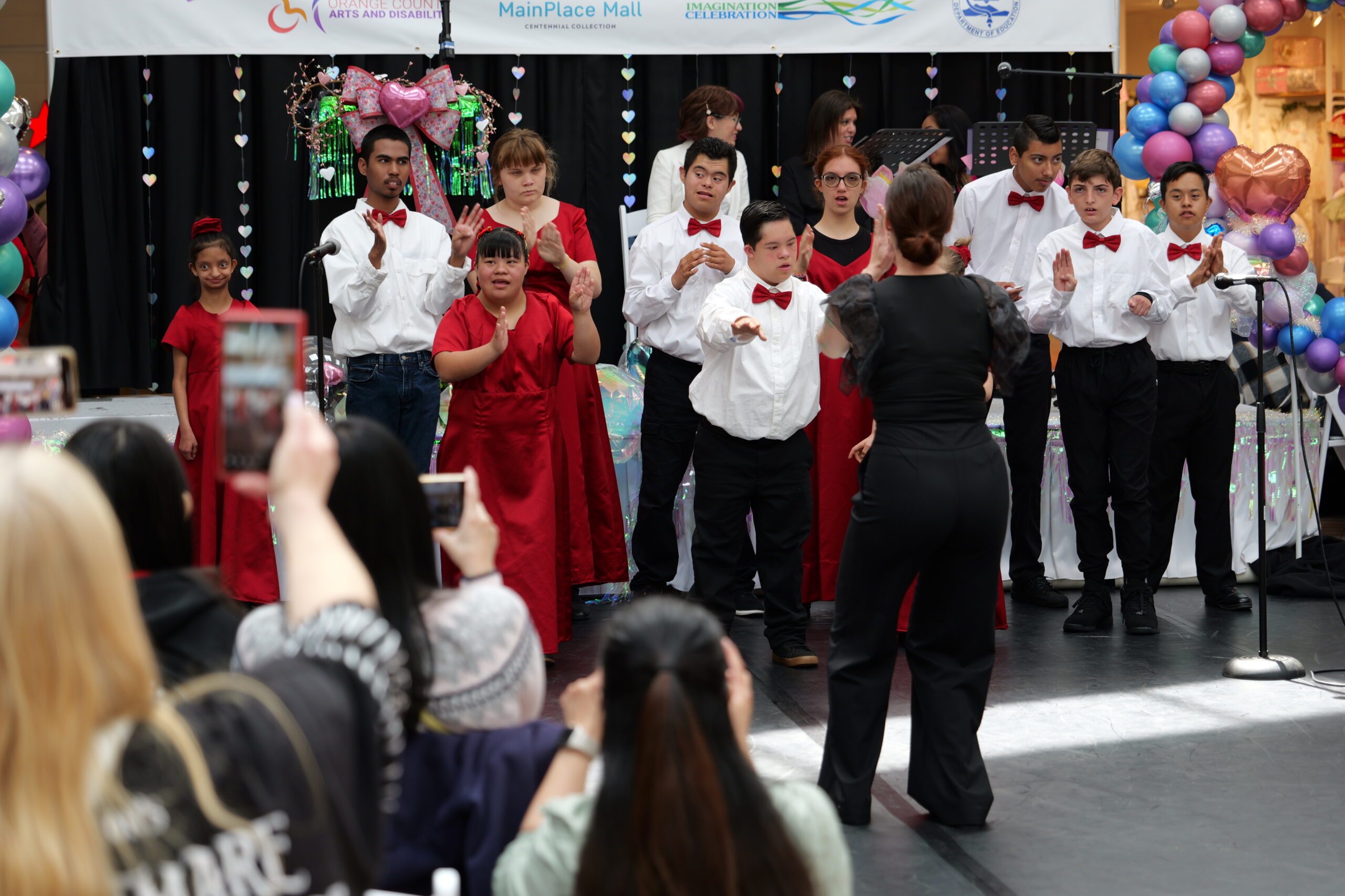 Student performers take the stage during the 2025 Orange County Arts and Disability Festival at MainPlace Mall in Santa Ana, themed “Art from the Heart.”