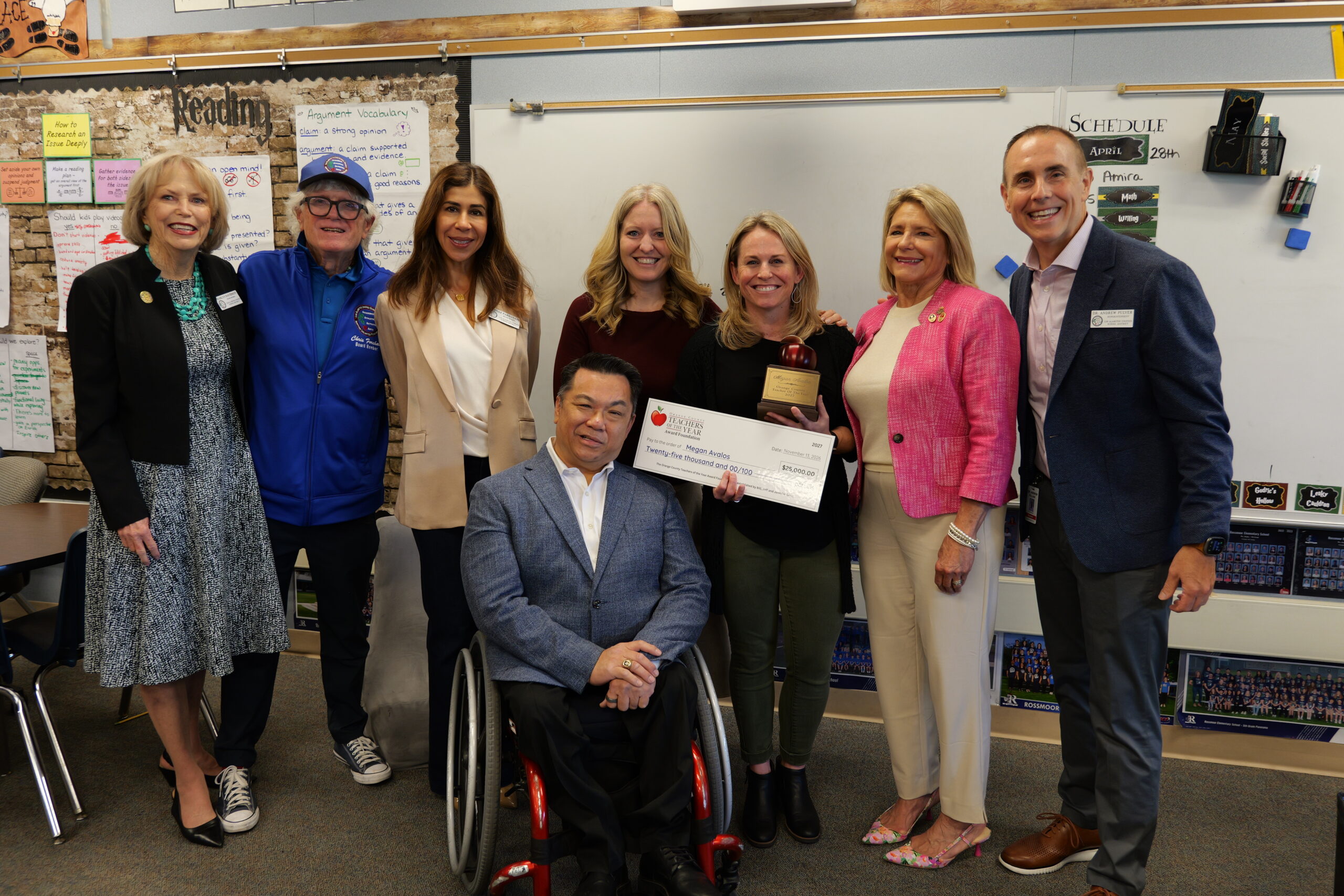 Rossmoor Elementary School teacher Megan Avalos receives congratulations on becoming one of six 2027 Orange County Teachers of the Year by County Superintendent Dr. Stefan Bean, Los Alamitos Unified Superintendent Dr. Andrew Pulver and Los Alamitos USD Board Trustees.
